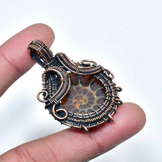 Terra Relic – Copper-Wrapped Fossil Pendant