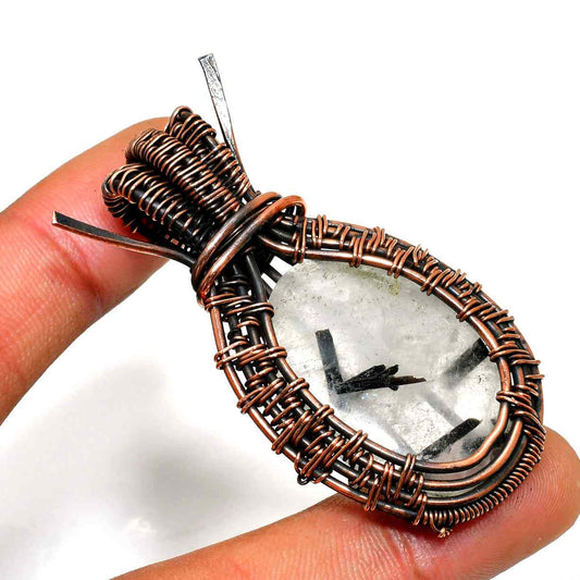 Serenity’s Embrace – Copper-Wrapped Quartz Pendant