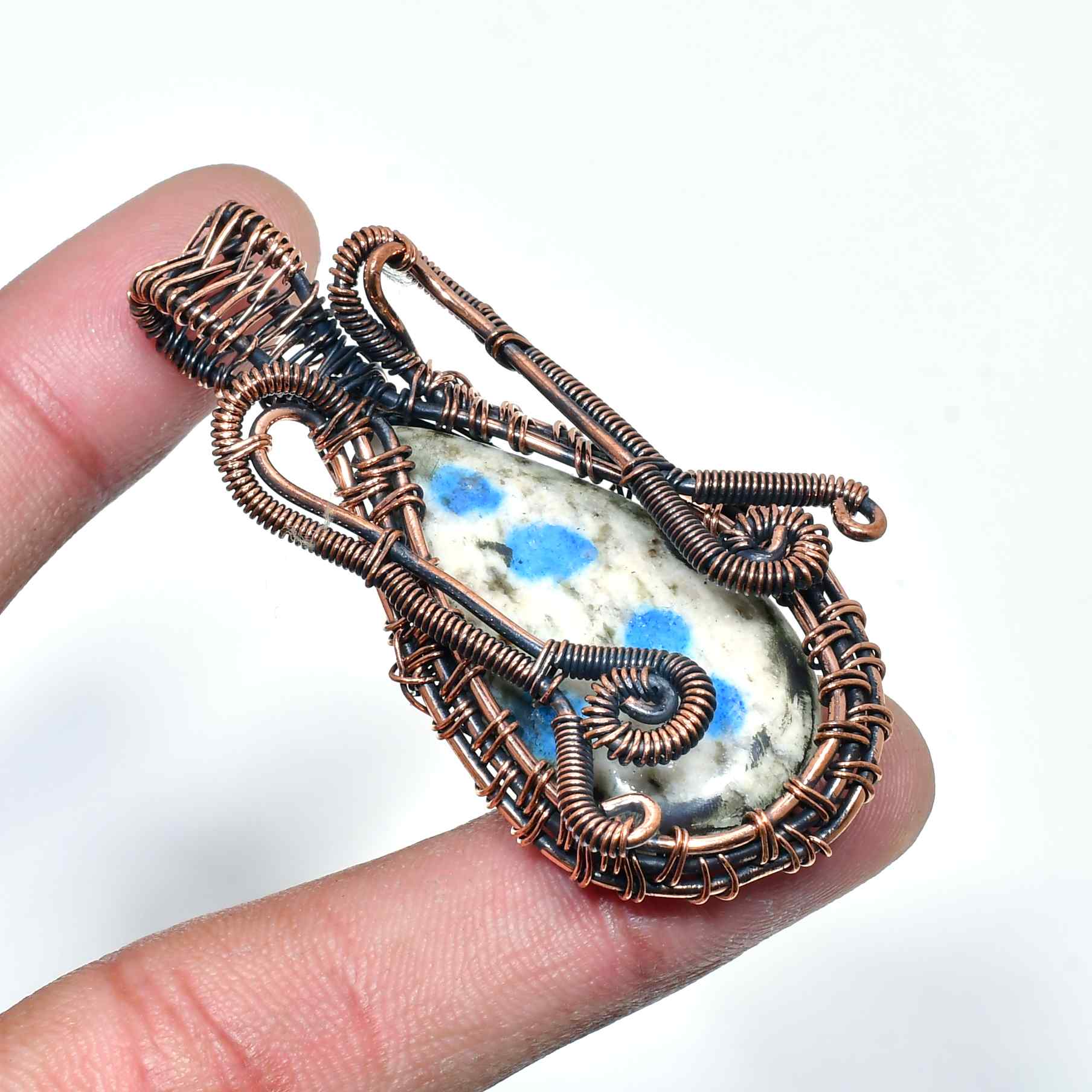 Clarity’s Embrace – Sodalite Copper Pendant