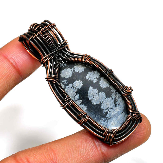 Winter's Embrace – Snowflake Obsidian Copper Pendant