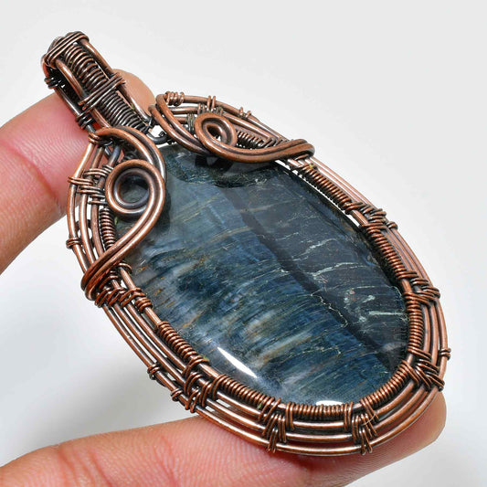 Harmony’s Embrace – Kyanite Copper Pendant
