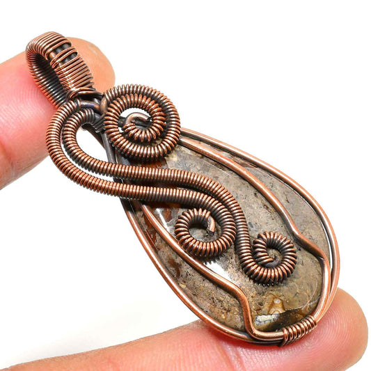 Gaia’s Embrace – Oxidized Copper Wrapped Stone Pendant