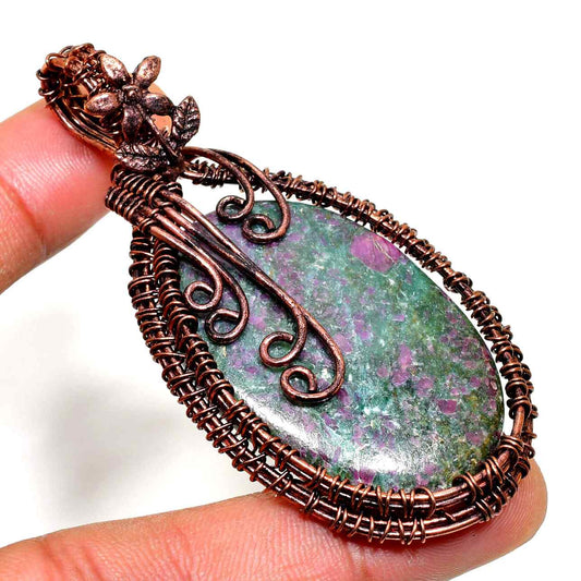 Ember’s Essence – Rhodonite & Oxidized Copper Pendant