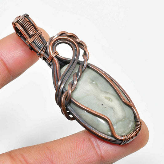 Serenity’s Embrace – Jade & Oxidized Copper Pendant