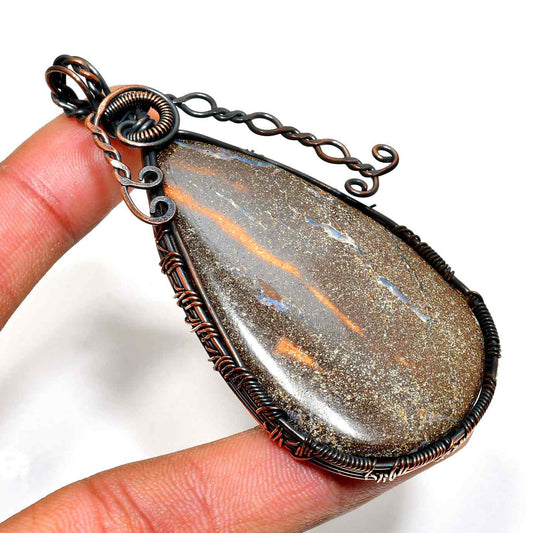 Earth’s Embrace – Grounding Stone Copper Pendant