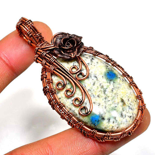 Gaia’s Embrace – Copper-Wrapped Gemstone Pendant