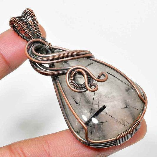 Raven’s Embrace – Smoky Quartz Copper Pendant
