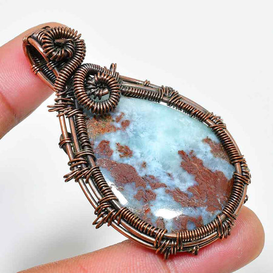 Serenity’s Embrace – Blue Lace Agate Copper Pendant