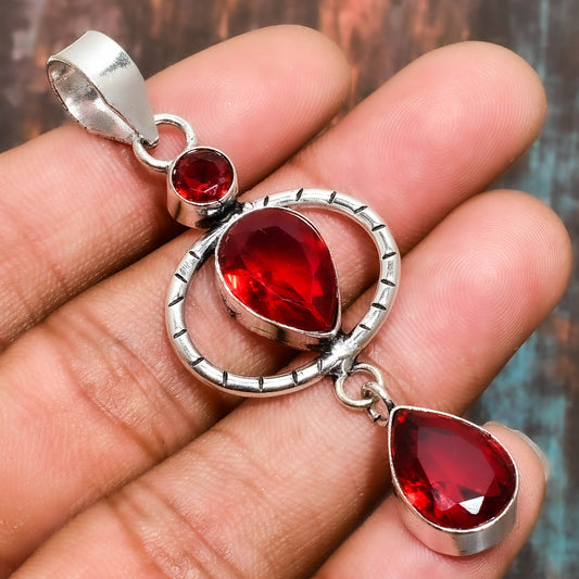 Scarlet Embrace – Ruby Silver Pendant