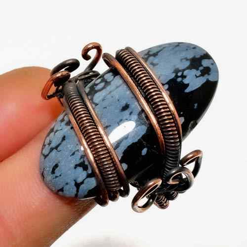 Terra’s Embrace – Obsidian Copper Pendant
