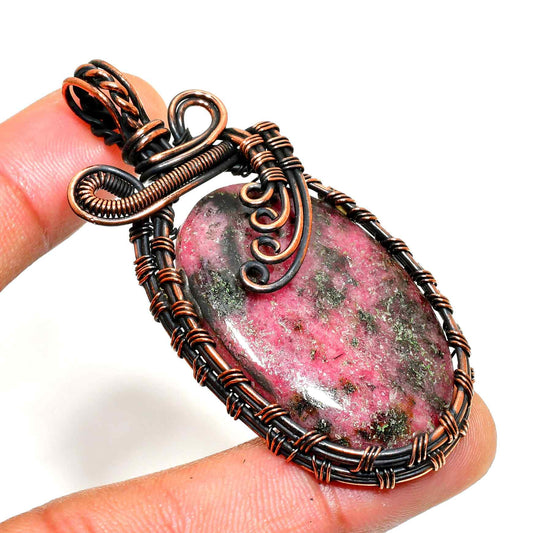 Compassion’s Embrace – Rhodonite Copper Pendant