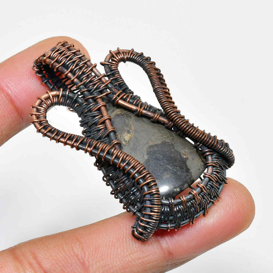 Terra’s Embrace – Raw Stone Copper Pendant