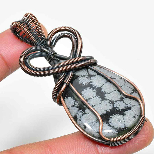Ember’s Grace – Snowflake Obsidian Copper Pendant