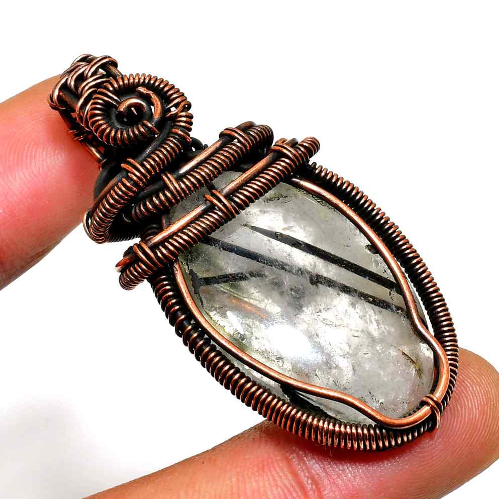 Zephyr’s Embrace – Copper-Wrapped Quartz Pendant