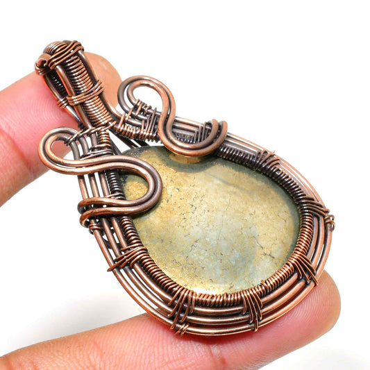 Earthbound Embrace – Copper-Wrapped Stone Pendant