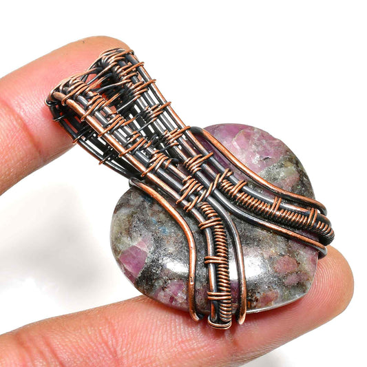 Ember’s Essence – Rhodonite & Copper Harmony Pendant