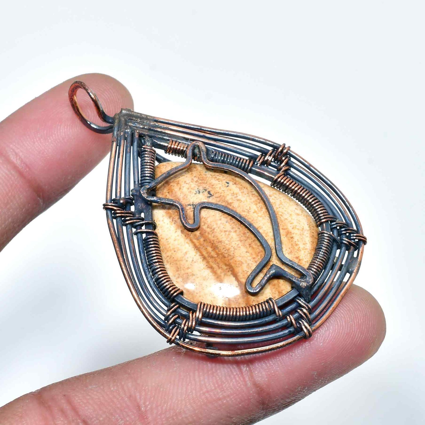 Dolphin’s Grace – Copper-Wrapped Ocean Stone Pendant
