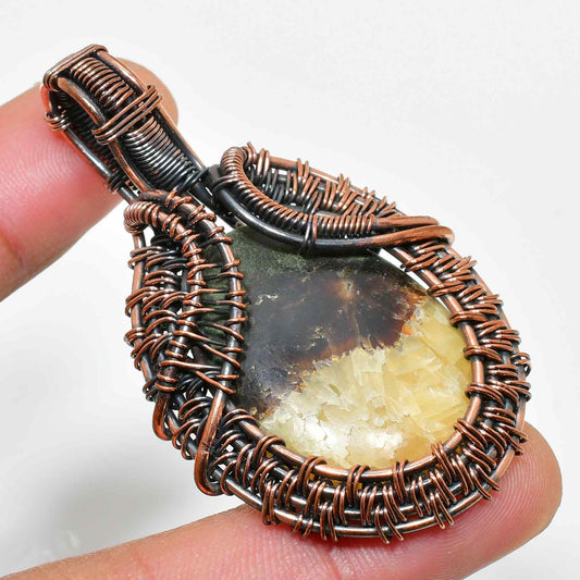 Ember’s Embrace – Copper-Wrapped Natural Stone Pendant