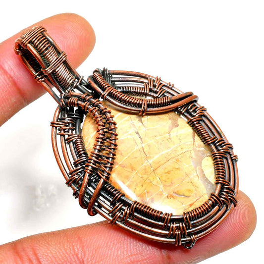 Ember’s Radiance – Earthstone Copper Wire Pendant