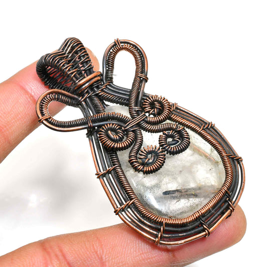 Clarity’s Embrace – Oxidized Copper Quartz Pendant