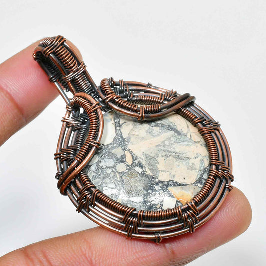Terra’s Embrace – Earthstone Copper Pendant