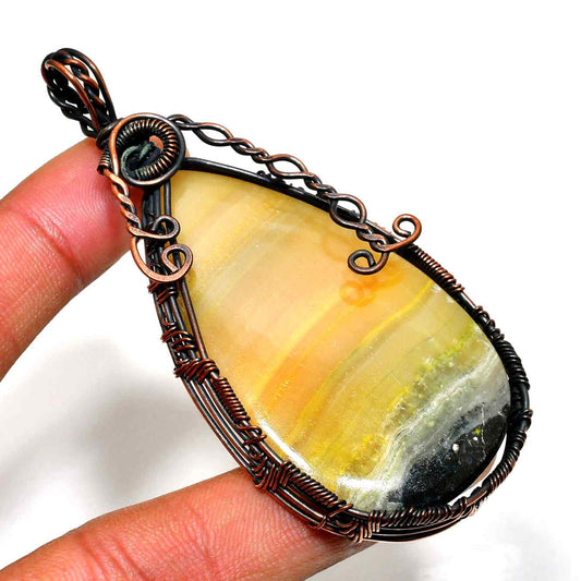 Aurora’s Flame – Sunstone Copper Pendant