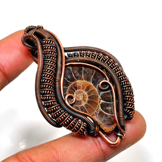 Fossil Embrace – Ammonite Copper Pendant