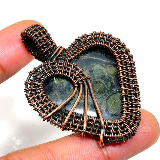 Earth’s Embrace – Copper-Wrapped Heart Stone Pendant