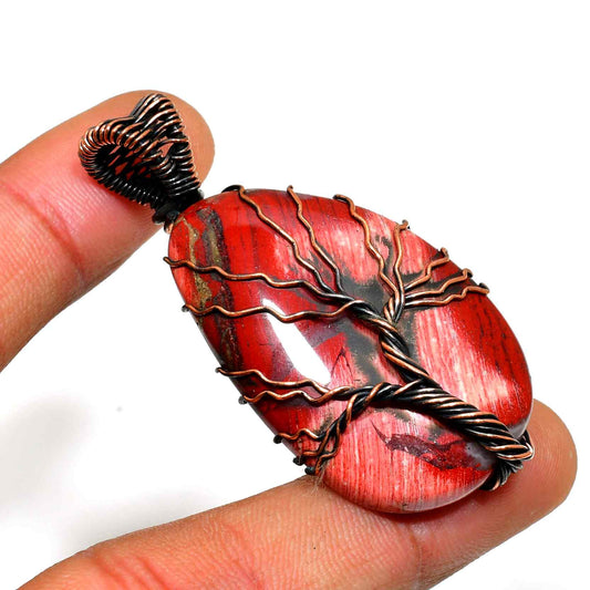 Crimson Valor – Red Tiger’s Eye Copper Pendant