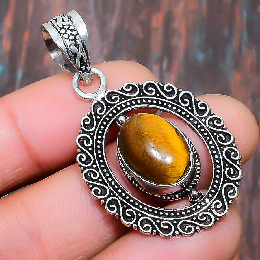 Glimmering Guardian – Tiger’s Eye Sterling Silver Pendant