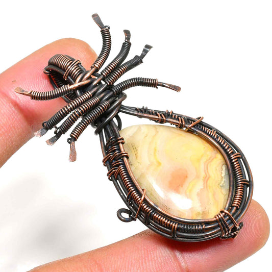Aurora’s Embrace – Crazy Lace Agate Copper Pendant