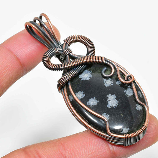Luna’s Shield – Snowflake Obsidian Copper Pendant