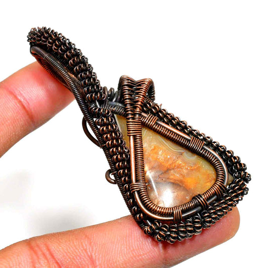 Gaia’s Embrace – Copper-Wrapped Natural Stone Pendant