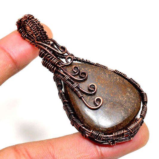 Nature’s Embrace – Copper-Wrapped Stone Pendant