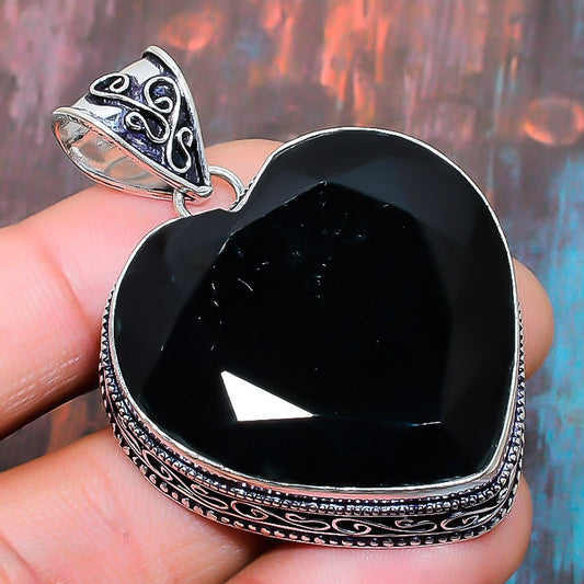 Heart of Obsidian – Silver Guardian Pendant
