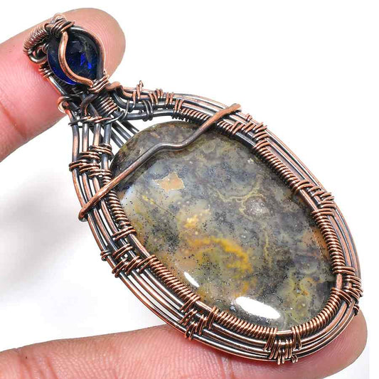 Terra’s Embrace – Artisan Copper-Wrapped Stone Pendant