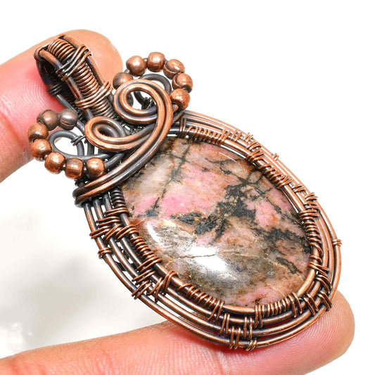 Aria’s Embrace – Rhodochrosite Copper Pendant