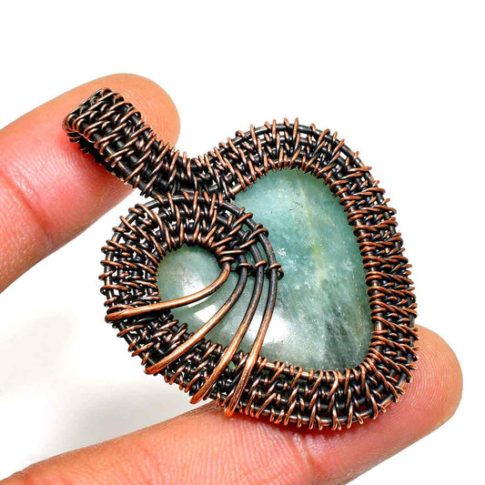Clarity’s Light – Handwrapped Copper Fluorite Pendant