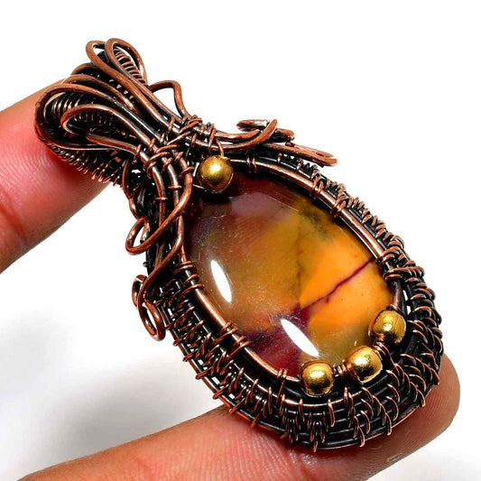 Gaia’s Embrace – Copper-Wrapped Gemstone Pendant