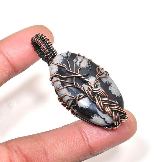 Gaia’s Anchor – Copper-Wrapped Black Stone Pendant