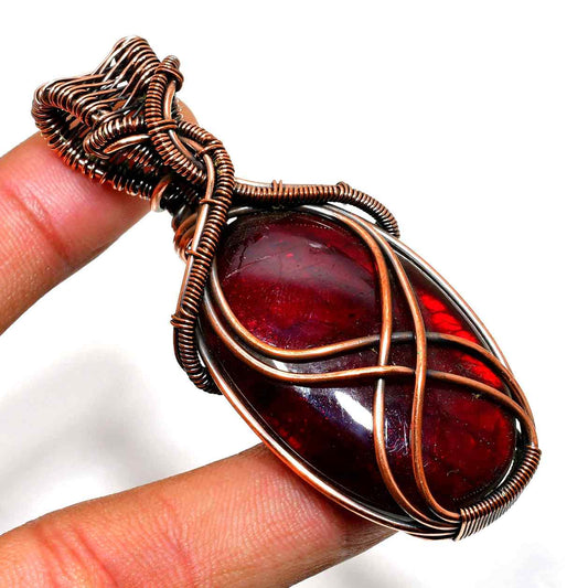 Ember’s Embrace – Garnet Copper Pendant