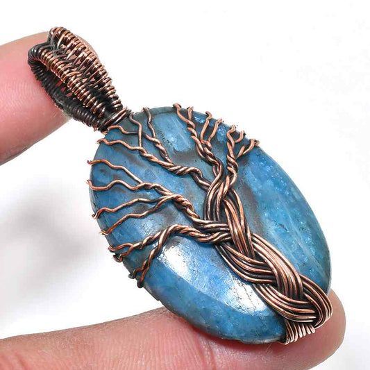 Ocean’s Embrace – Aquamarine Copper Tree of Life Pendant