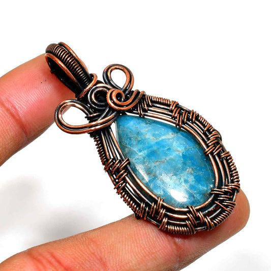 Azure’s Embrace – Aquamarine Copper Pendant