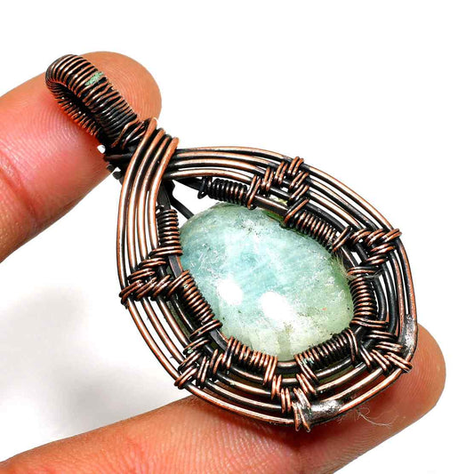 Celestial Embrace – Aquamarine Copper Pendant