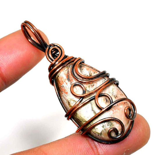 Ember’s Whisper – Copper-Wrapped Quartz Pendant