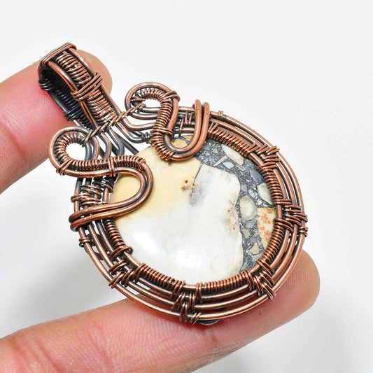Nature’s Embrace – Copper-Wrapped Stone Pendant