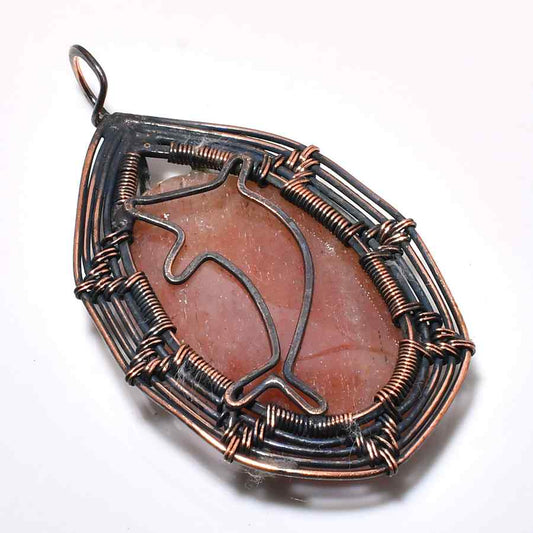Dolphin’s Embrace – Natural Stone & Copper Pendant