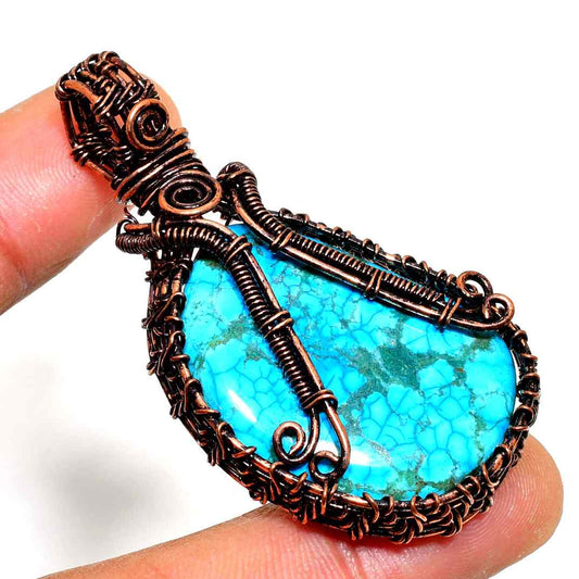Azure’s Embrace – Turquoise Copper Pendant
