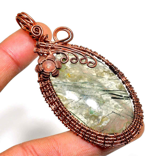 Gaia’s Radiance – Rutilated Quartz Copper Pendant