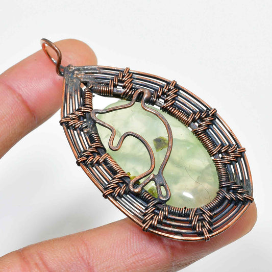 Aurora’s Glow – Handcrafted Peridot & Copper Pendant